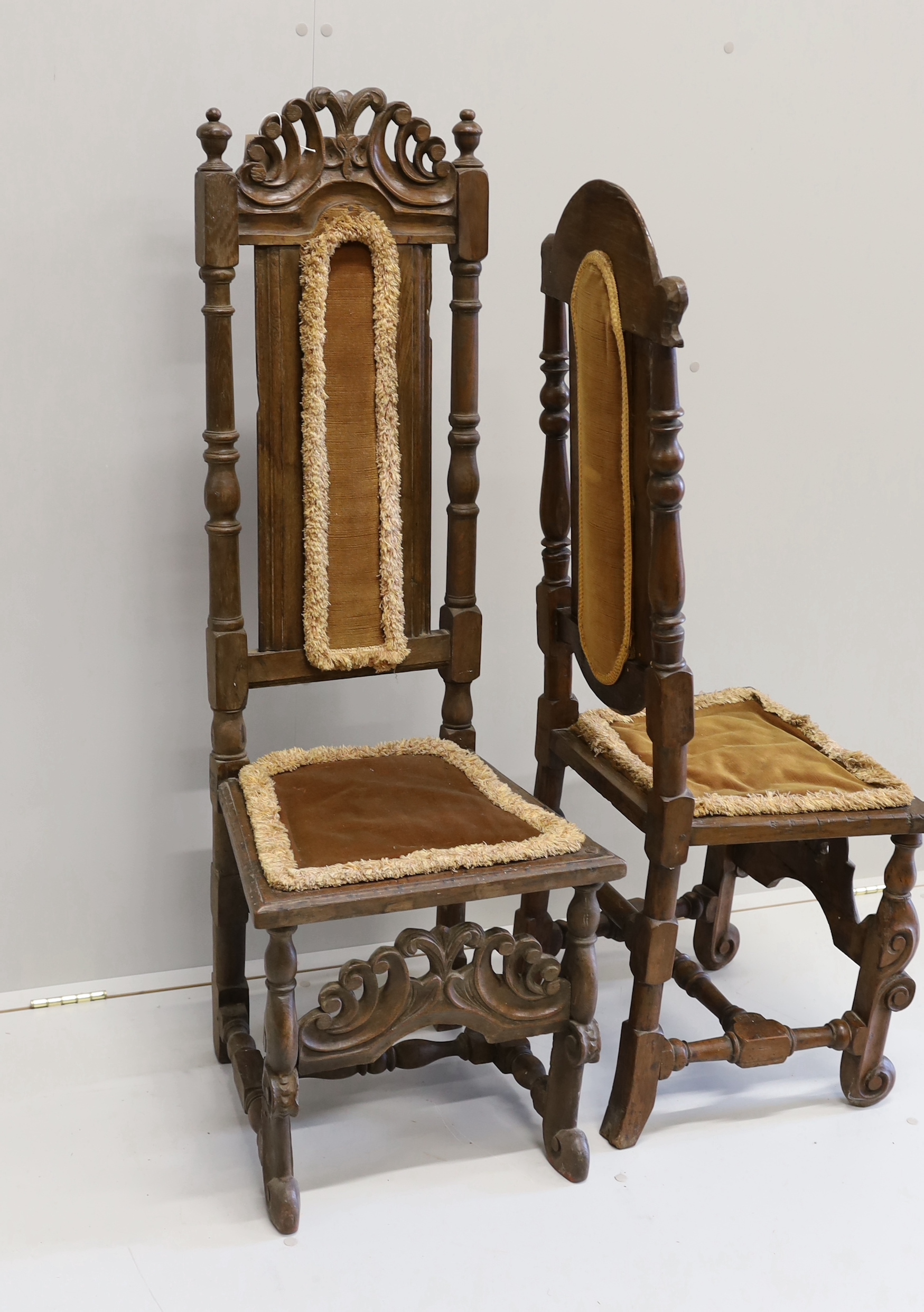 Two 18th century oak high back dining chairs, larger height 128cm